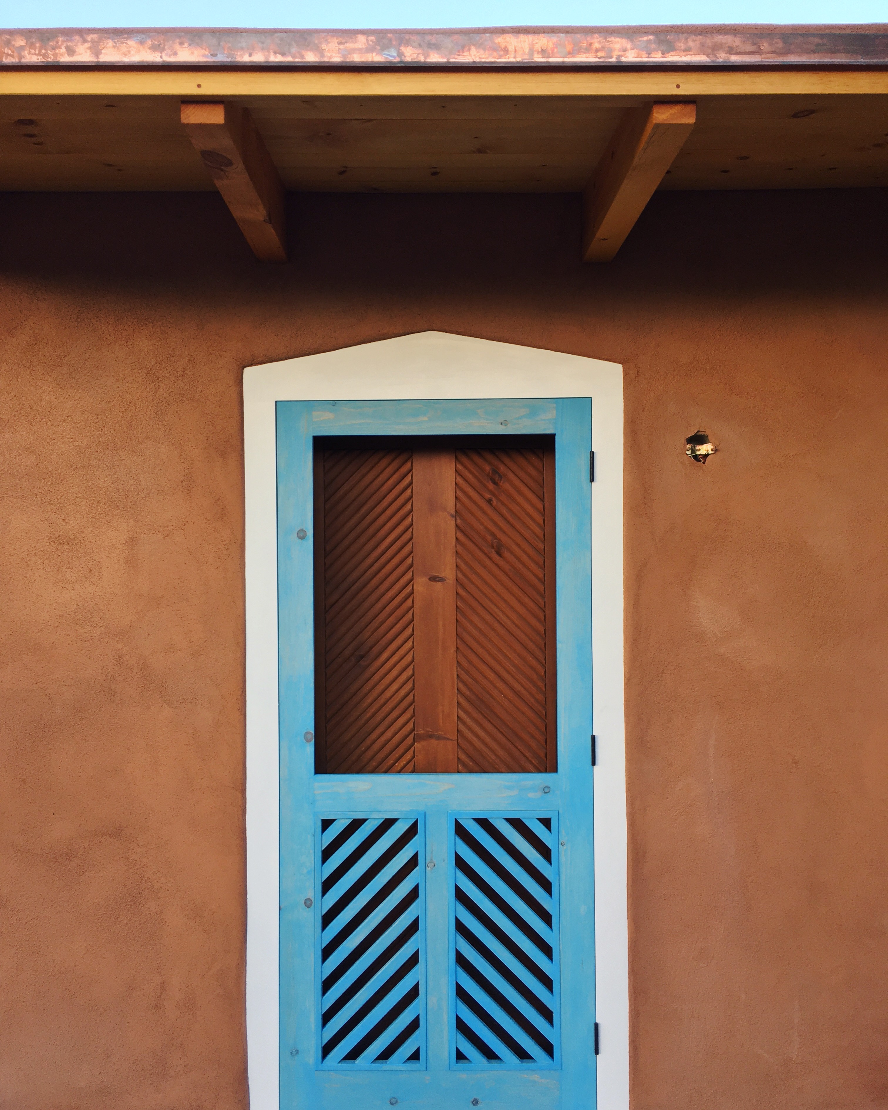 Adobe House Custom Door and Copper Roof